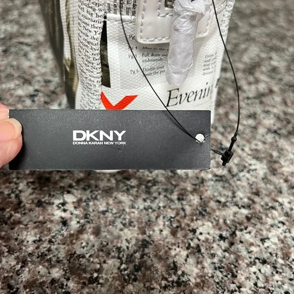 DKNY cosmetic bag. Brand new with tag. NYC scenery makes this a special item! - Picture 6 of 6